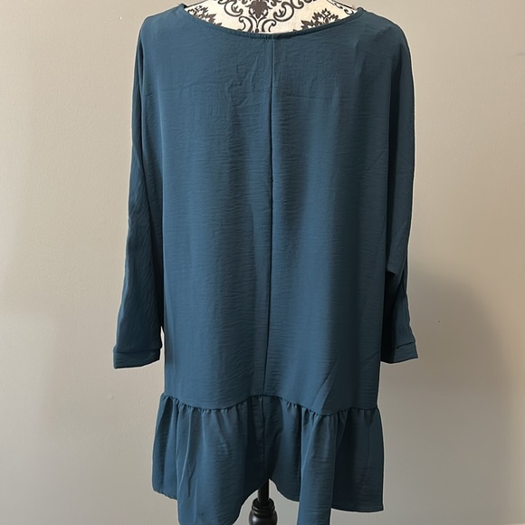 NWOT. Woman’s round neckline blouse with 3/4 length sleeves & ruffle hemline. - Picture 8 of 10